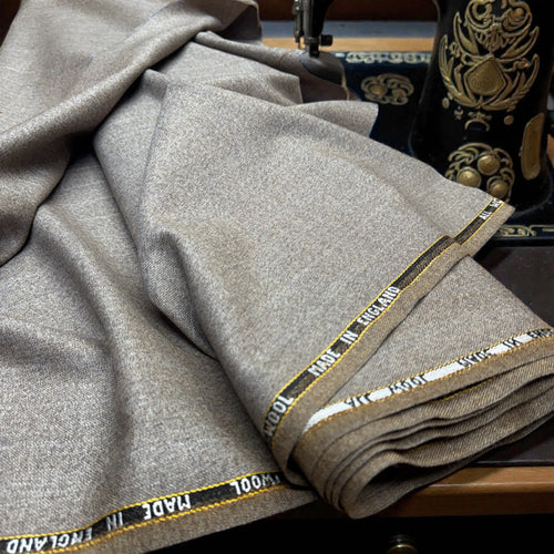 Light brown with a very feint light blue pinstripe