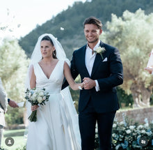 Groom in bespoke classic blue Wedding suit in a sunny location abroad